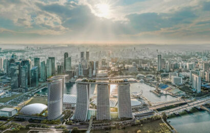 How do property prices in Singapore compare to other major cities?
